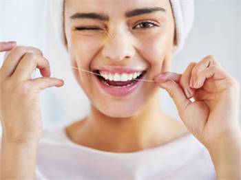 Flossing helps prevent the formation of plaque and tartar